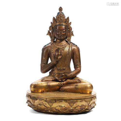 A GILT-BRONZE FIGURE OF SEATED BODHISATTVA