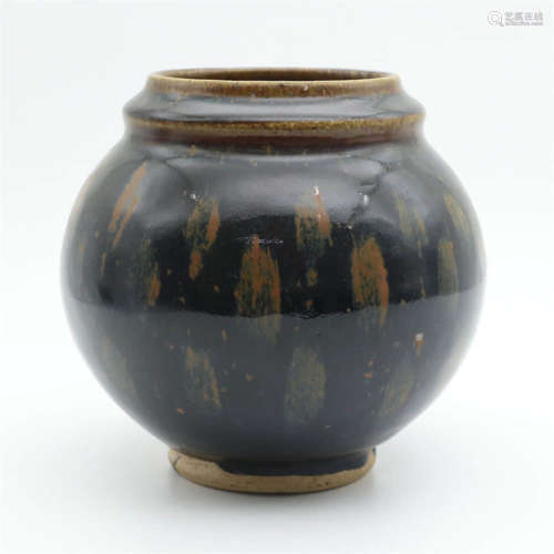 A Cizhou Brown-Splashed And Black-Glazed Ovoid Jar