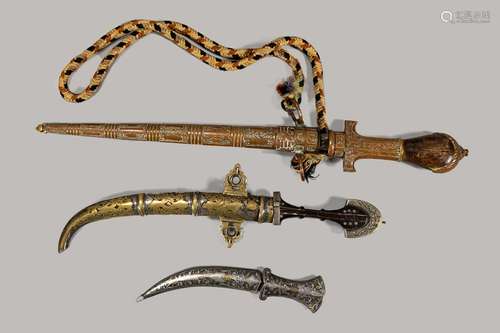 Three oriental daggers