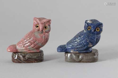 Two stone owls