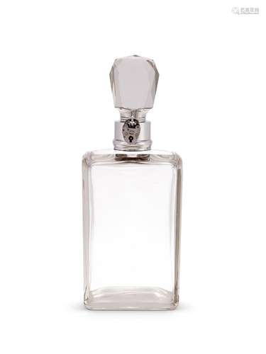 A large Edwardian silver mounted lockable glass decanter and...