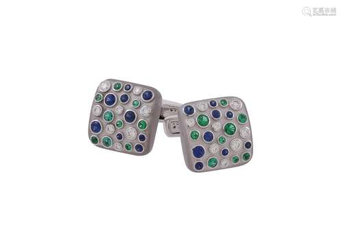 A pair of diamond, sapphire and emerald cufflinks by William...