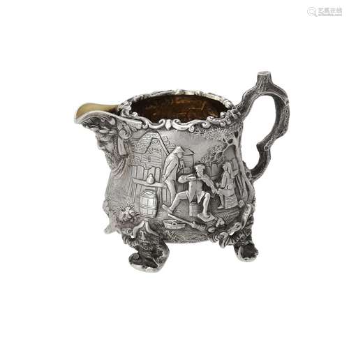 A Victorian silver bombé shaped cream jug by Richard Sibley