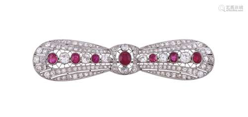 An early 20th century ruby and diamond bow brooch