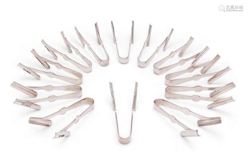 A set of twelve silver asparagus eaters or individual tongs ...