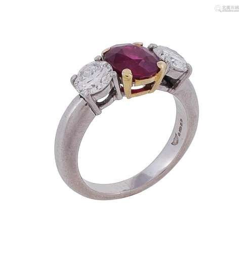 A three stone ruby and diamond ring