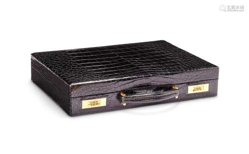 Y Chaumet, a crocodile and 18 carat gold mounted briefcase