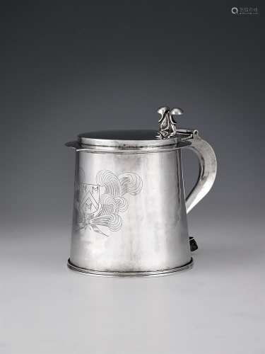 A Commonwealth or Charles II silver straight-tapered tankard...