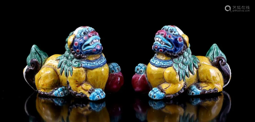 2 Chinese porcelain polychrome decorated foo dogs