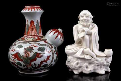 Earthenware Ghendi and a white porcelain figurine