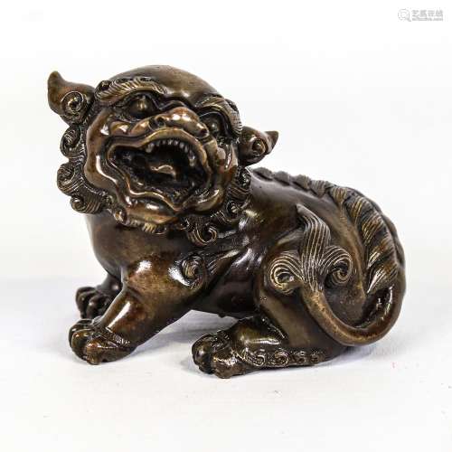 A Chinese patinated bronze Dog of Fo, length 8.5cm