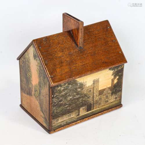 A mahogany cottage-shaped moneybox, with printed rural scene...