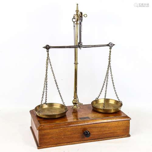 Victorian brass balance scales, on mahogany base with drawer...