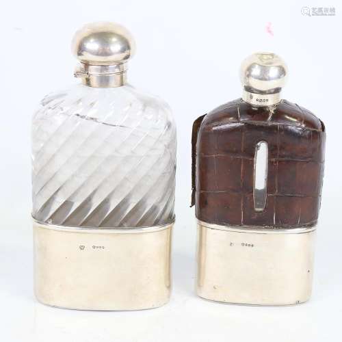 2 very large silver-mounted spirit flasks, by Asprey and Dre...