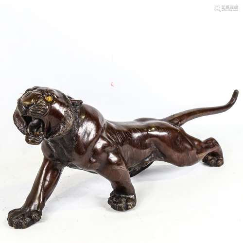 An Meiji period, Japanese, patinated bronze tiger, with make...