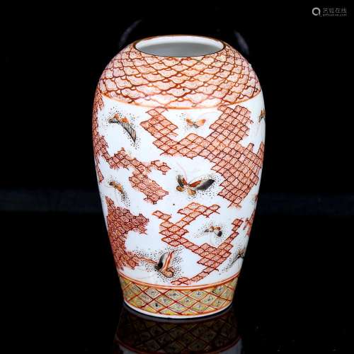 A Japanese porcelain vase, with painted butterflies and geom...