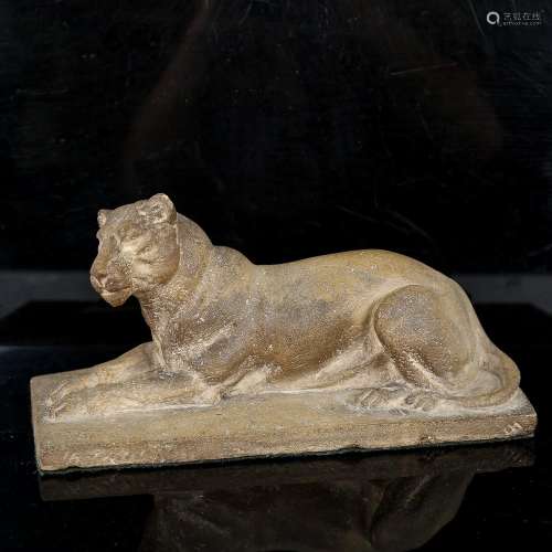 A hand sculpted clay lioness, early 20th century, unsigned, ...