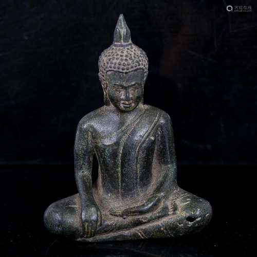 An Oriental patinated bronze seated Buddha, thought to be 15...