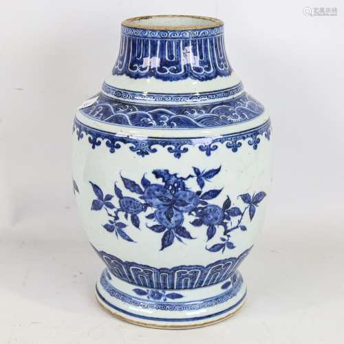 A Chinese blue and white porcelain vase, hand painted prunus...