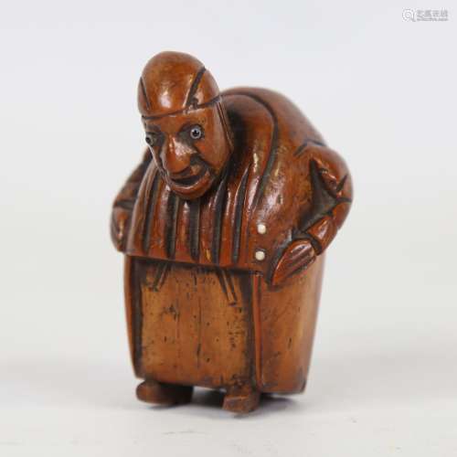 An 18th century coquilla nut snuffbox, in the form of a man ...