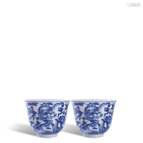 A pair of blue and white dragon shaped cups in Yongzheng of ...