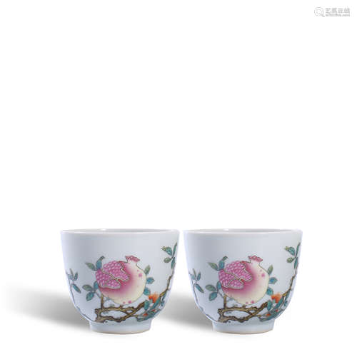 A pair of pastel cup with melon and fruit pattern in Qianlon...