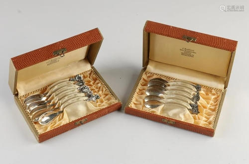 Two cassettes with silver spoons, 835/000, with handles