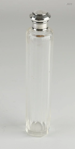 Large crystal odeur bottle with a silver screw cap,