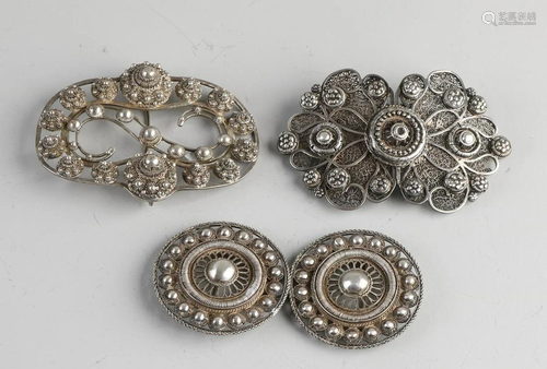 Lot with 3 silver buckles, 833/000, contoured models