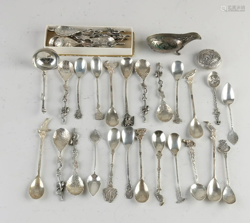 Large lot of silver, 835/000, with 12 spoons with