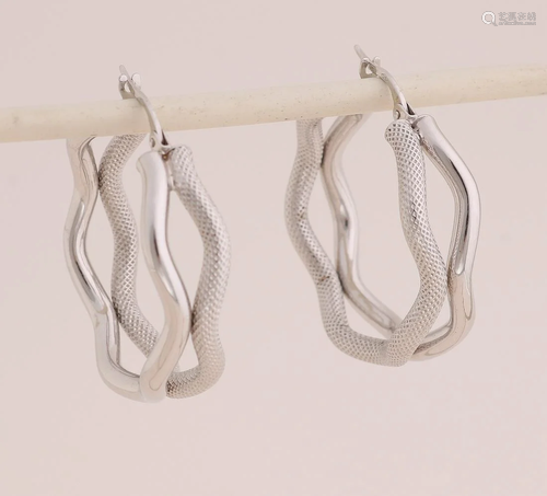 White gold earrings, 585/000. creoles made of 2 wavy