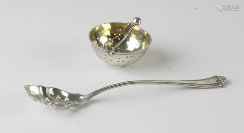 Antique silver spout strainer with gilded inside,