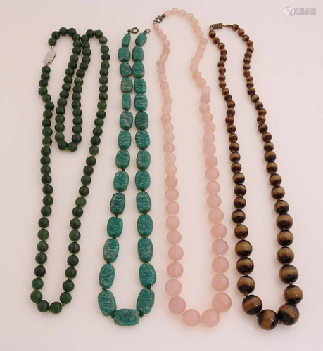 Four necklaces made of precious stones, one necklace