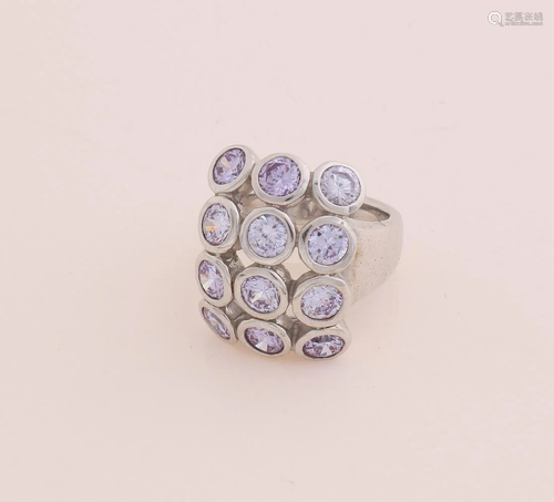 Large silver ring, 925/000, with lilac stones. Ring