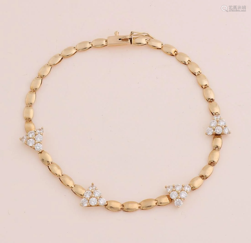 Yellow gold bracelet, 585/000, with cubic zirconia.