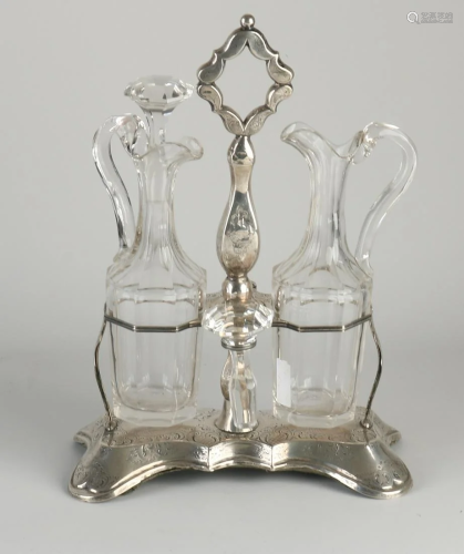 Beautiful oil/vinegar set with silver. Set of crystal