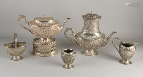 Silver crockery, 833/000, with a coffee pot, tea pot,