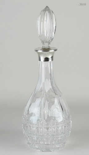 Cut crystal decanter with stopper and cut star on the