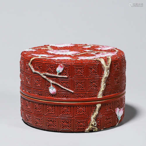 A plum blossom carved red glazed porcelain box