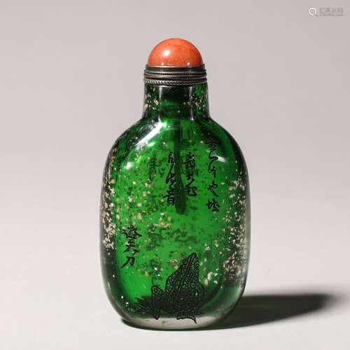 An inscribed gold sprinkled glass snuff bottle