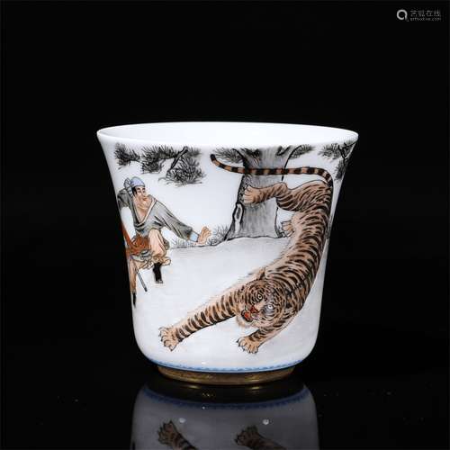 A gilt ink colored Wusong and tiger porcelain cup