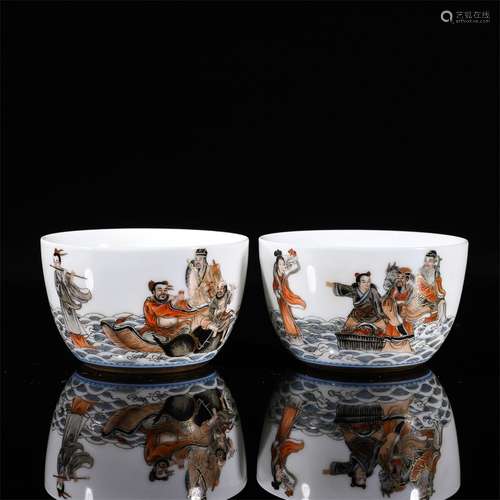 A pair of ink colored figure porcelain cups