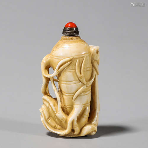 A melon patterned antler snuff bottle