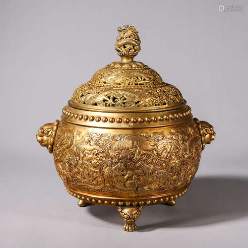 A qilin patterned gilding copper incense burner with lion he...