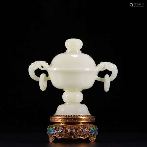 A double-eared Hetian jade censer with a gilding silver pede...