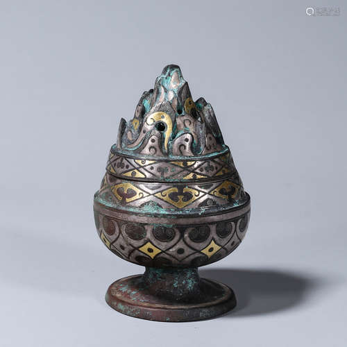 A mountain shaped bronze incense burner