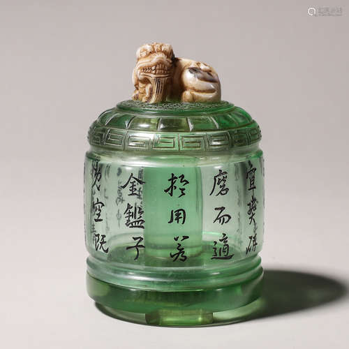 An inscribed glass thumb ring box