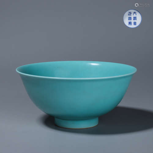 A green glazed porcelain bowl