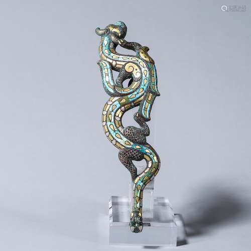 A bronze turquoise-inlaid dragon shaped hook