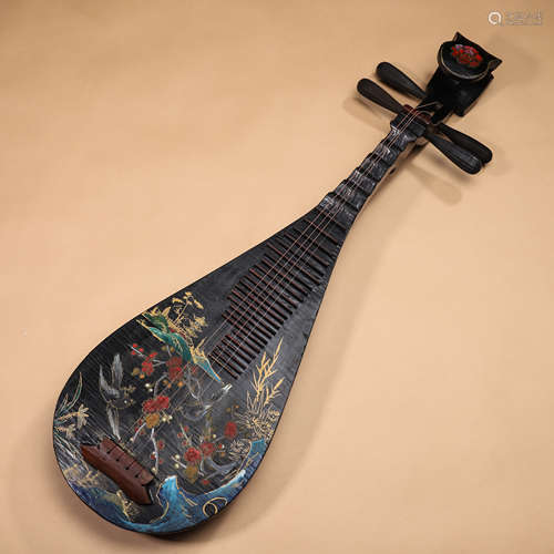 A lacquered Chinese lute